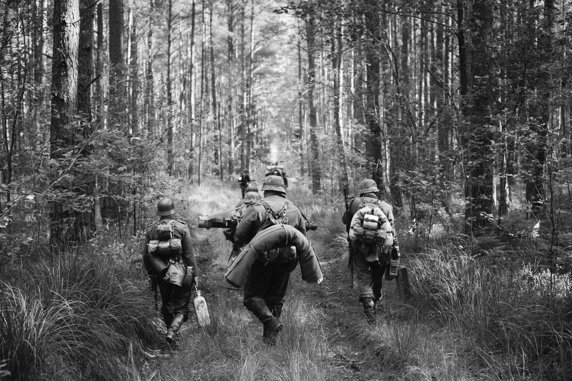 German Infantry Soldiers In World War II Marching Walking Along